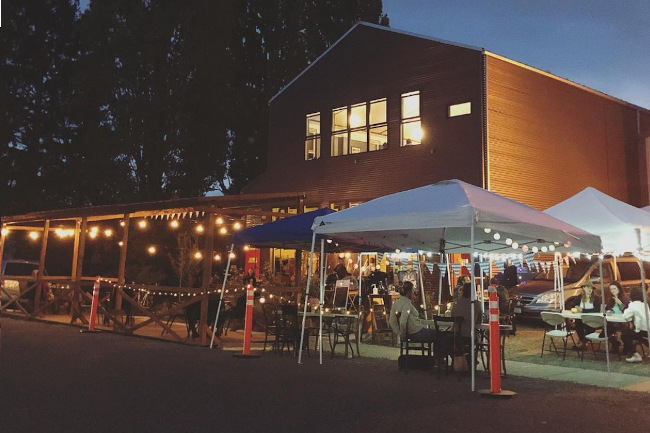 otherlands beer in bellinghan washington - temporary tents and a permanent awning.