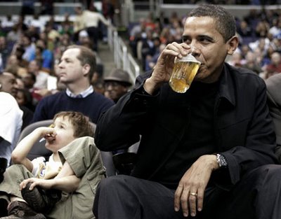 President Obama enjoying a beer at a Washington Wizard's game. Nice to know that even he can't afford to drink good beer at professional sporting events.