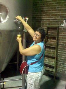 Sampling a beer from a zwickel at Alpine Brewing, circa 2009. 