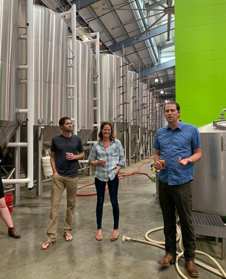 Left to Right: Kevin Smith, Meghann Quinn, and Kevin Quinn lead a tour of the brewery.