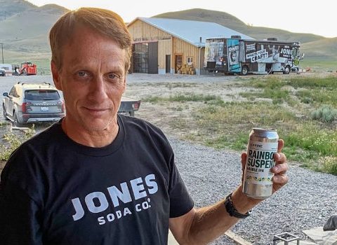 Skateboarding legend Tony Hawk with a can of beer from Seapine Brewing.