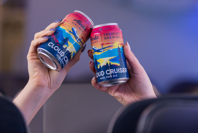 Two cans of Cloud Cruiser IPA.