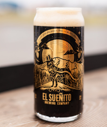 El Sueñito Brewing's commemorative 1st anniversary pint glass filled with the anniversary stout. 