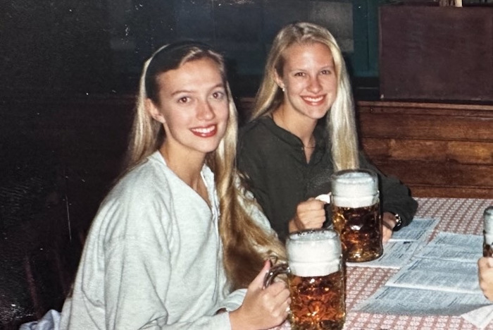 Picture of two women with very large beers.