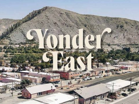Yonder East, text over a picture of the town of Cashmere, WA.