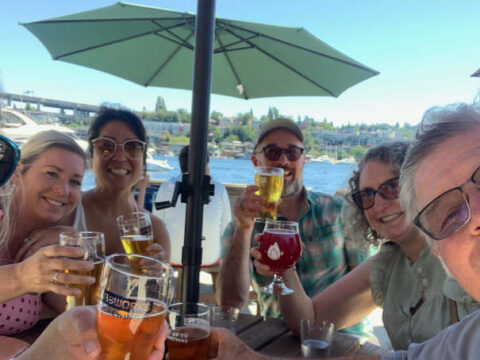 Group of friends enjoying beers at Gasworks Brewing.