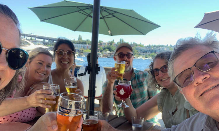 Group of friends enjoying beers at Gasworks Brewing.