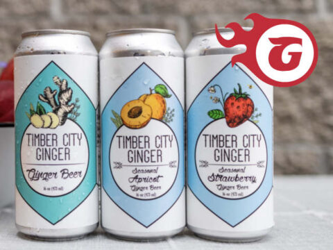 Cans of Timber City Ginger Beer and the Georgetown Brewing logo.