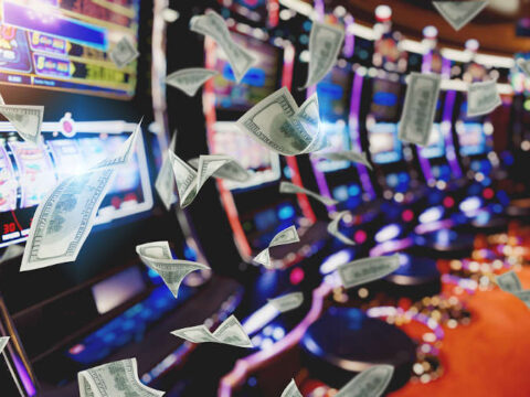 Slot machines with currency flying in the air