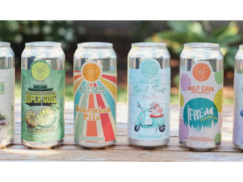 Cans of Self Care non-alcoholic beer.