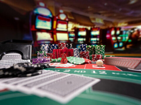 Casino set cards, dice and chips on a table