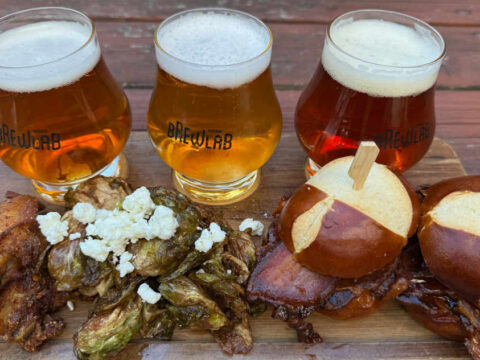 Three glasses of beer along with food pairings