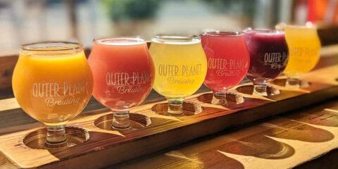 A colorful flight of beers at Outer Planet Brewing