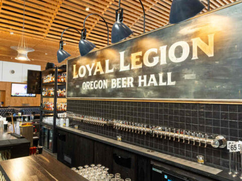 A long row of taps behind a bar