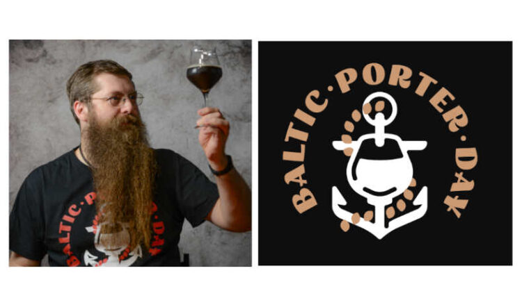 A man holding a glass of baltic porter