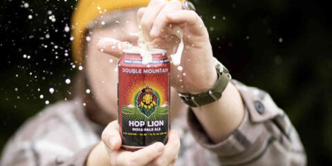 Double Mountain beers and ciders now in cans for the first time A colorful can of beer getting cracked open