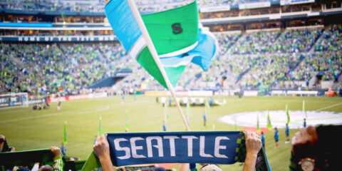 A stadium full of football fans in seattle before a match