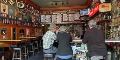 People sitting at the bar at Toronado Pub