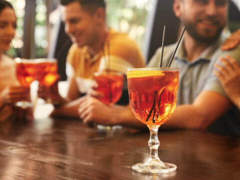 A Slight Course Correction for Ye Olde Washington Beer Blog Friends at a table enjoying cocktails