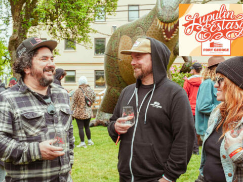 Breweries From Across the Nation are Coming to Astoria, Oregon People laughing and sharing beers at a festival