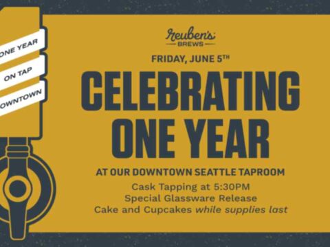 Reuben’s Brews Celebrating a Successful First Year at the Downtown Taproom A poster for the anniversary party at Reuben's Brews, black lettering against a gold background