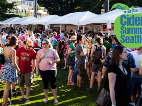 Cider Summit Seattle Returns for a 15th Delicious Year This September A crowd enjoying a cider festival on a sunny day