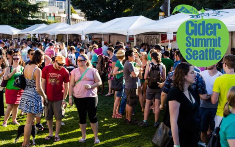 Cider Summit Seattle Returns for a 15th Delicious Year This September A crowd enjoying a cider festival on a sunny day