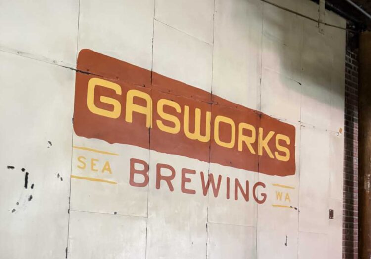 The Gasworks Brewing logo painted on a white wall.