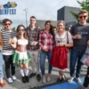 Seattle’s Largest Beer Fest Returns to the Streets of Fremont, September 18 – 20 A group of friends at Fremont Oktoberfest pose for the camera