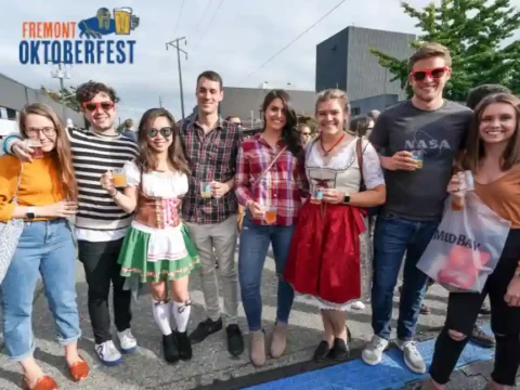 Seattle’s Largest Beer Fest Returns to the Streets of Fremont, September 18 – 20 A group of friends at Fremont Oktoberfest pose for the camera
