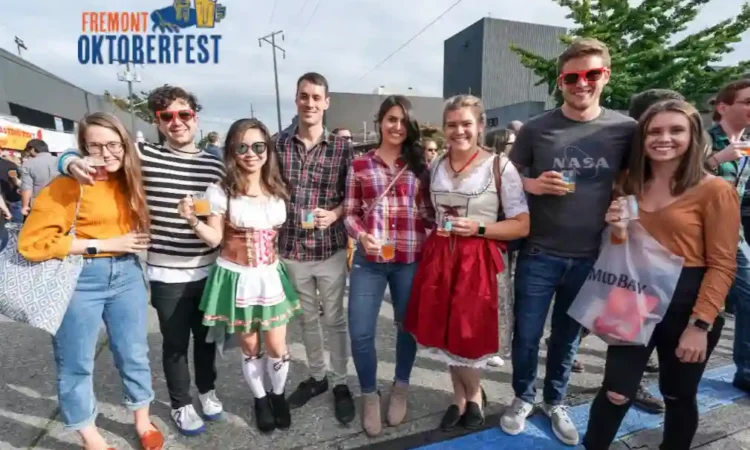 A group of friends at Fremont Oktoberfest pose for the camera