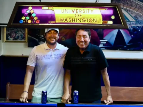 Beer-Loving Huskies Will Love This One: 6 Killer Native Lager. IYKYK Two men standing in a bar and leaning on a pool table