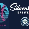 Silver City Brewery’s Annual Pub Crawl to the Ballgame is Back logos for the brewery and the baseball team against a blue background