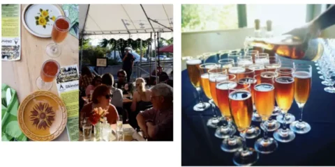 A crowd enjoys a cider dinner in on a tented patio