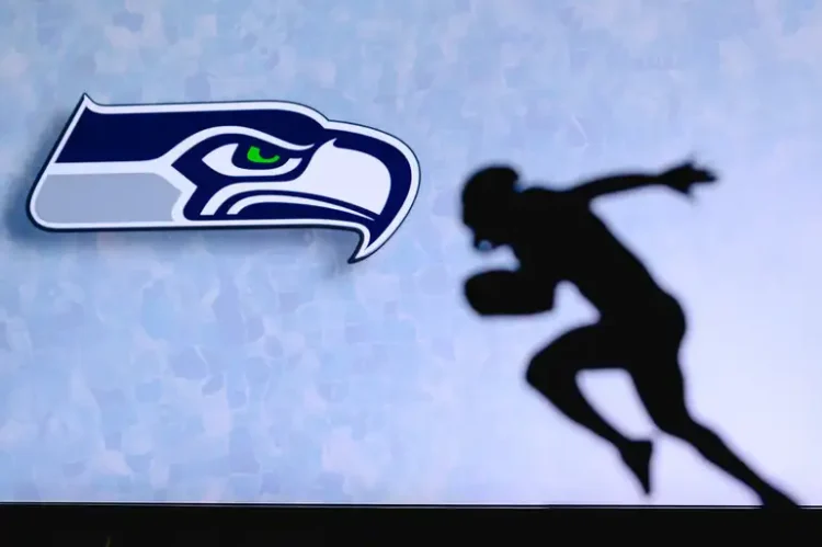 Moneyline, Spread, Totals: Seahawks Betting Terms for Beer Fans Seattle Seahawks logo alongside a silhouette of a football player running.