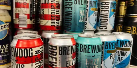What Separates a Forgettable Can from One You Reach for Again Distinctive craft beer cans with bold colours and creative branding displayed together, illustrating the packaging design that makes a beer memorable and worth reaching for again.