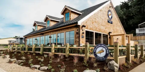 Pelican Brewing Opens Another Location on the Oregon Coast, in Yachats A seaside pub with a peaked roof and weathered siding