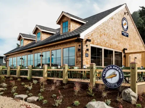 A seaside pub with a peaked roof and weathered siding