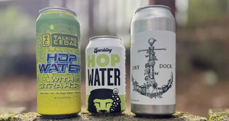 What Is Hop Water and Why You Should Drink It Three different kinds of hop water in cans.